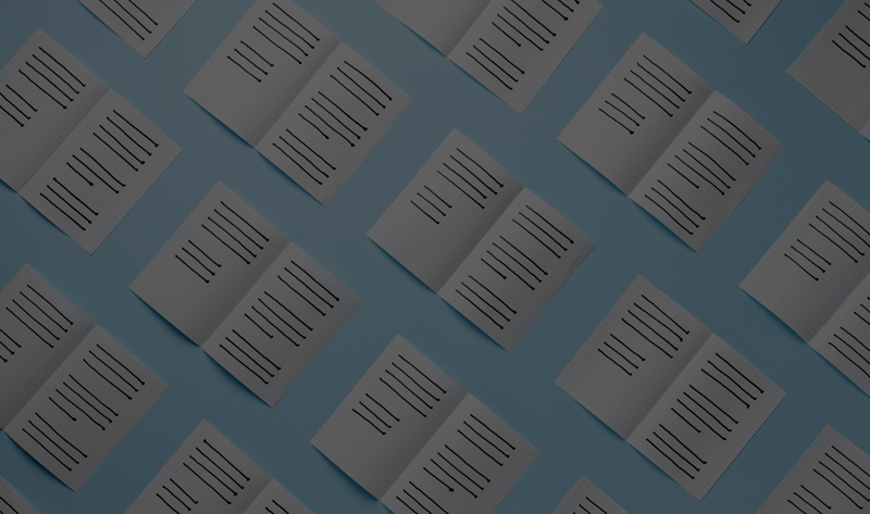 Scattered papers with black lines on a blue background.